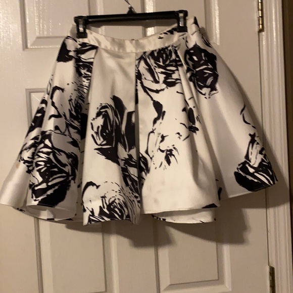 Black and white hoco dress. Worn twice. Bottom is a little dirty not noticeable. - Picture 2 of 4